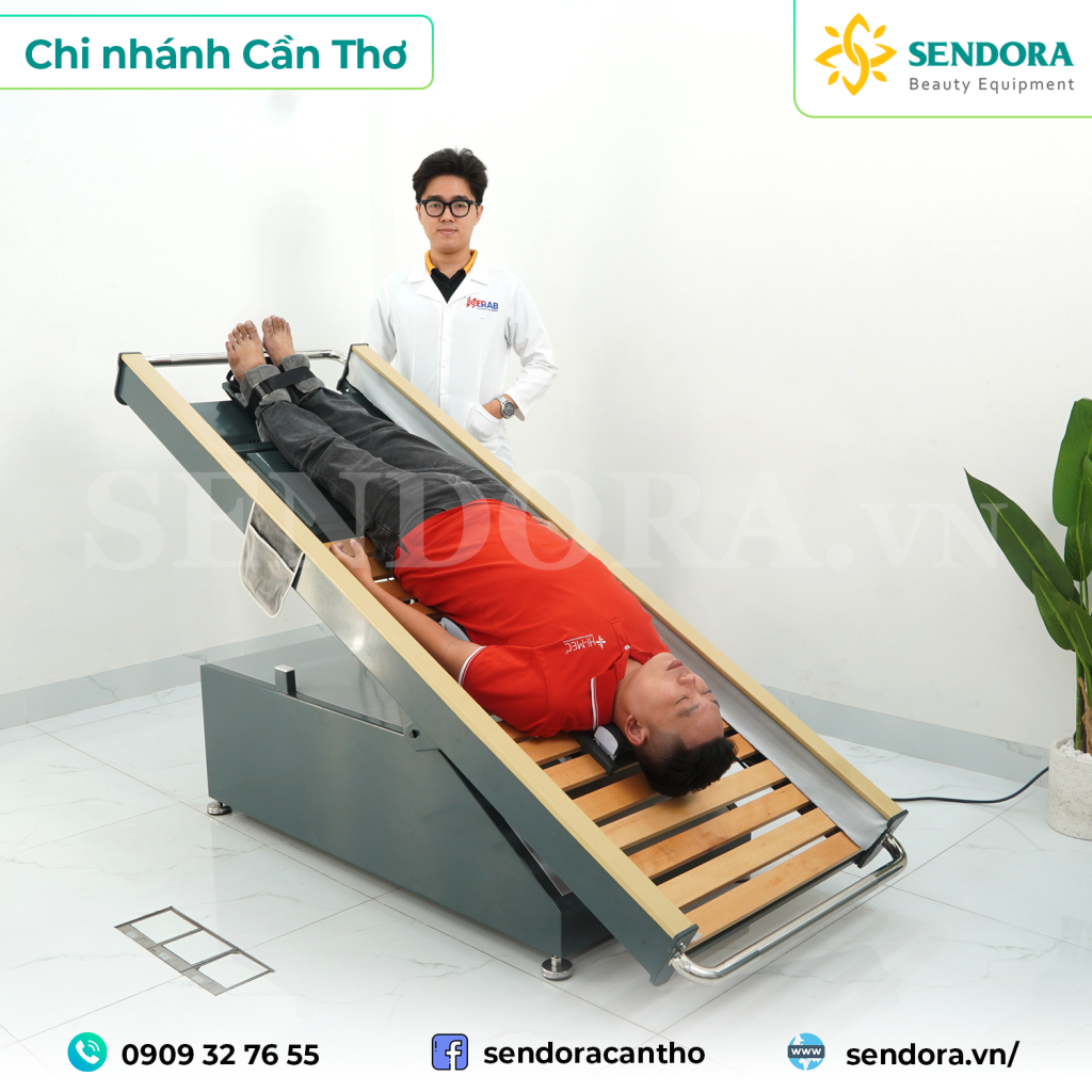 giường rung lắc cột sống